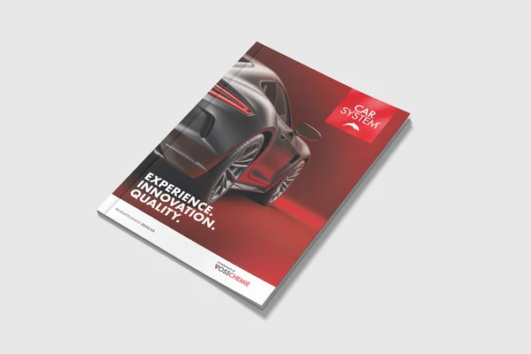 Still image of the 2025 CARSYSTEM product catalogue placed on a table.